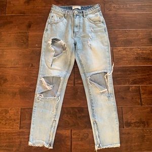 One teaspoon heavily distressed inside zip ankle jeans